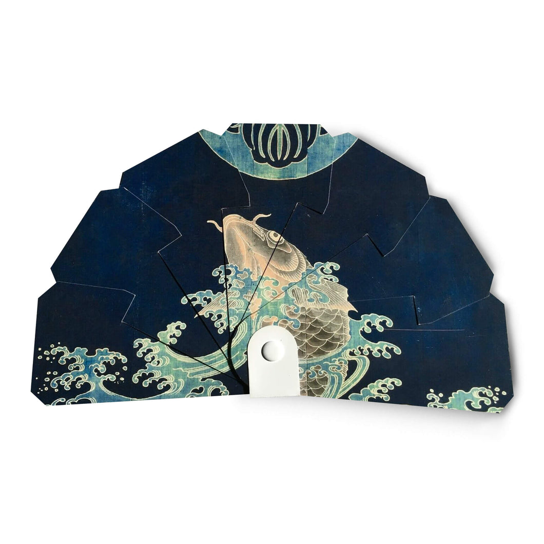 Paper fan of museo vincenzo vela with blue fish